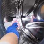 cara membersihkan mesin cuci bukaan atas