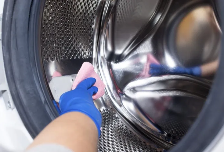cara membersihkan mesin cuci bukaan atas